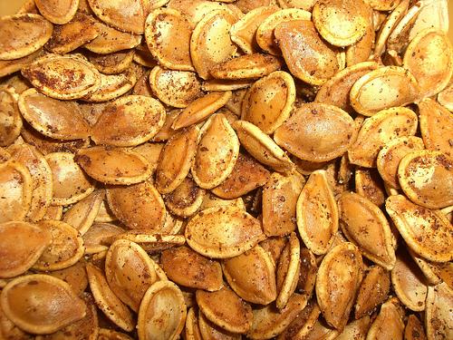 Roasted pumpkin seeds are a tasty way to dispose of your pumpkins innards after Jack OLantern carving.