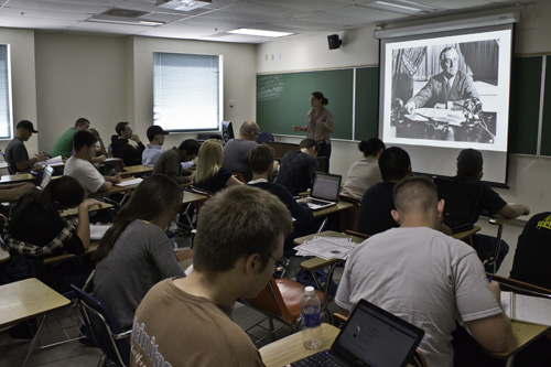 picture of teacher and students in classroom