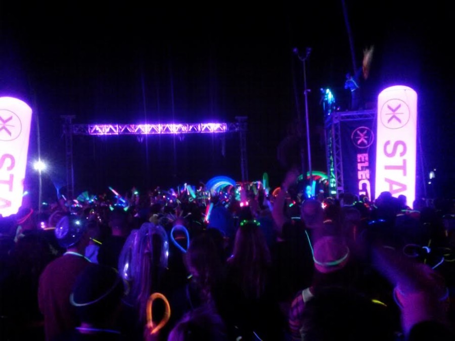 Bright+lights+and+a+crowd+of+glowsticks+at+the+starting+line+of+the+San+Diego+Electric+Run.