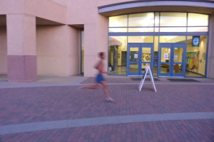 runner in blue shorts