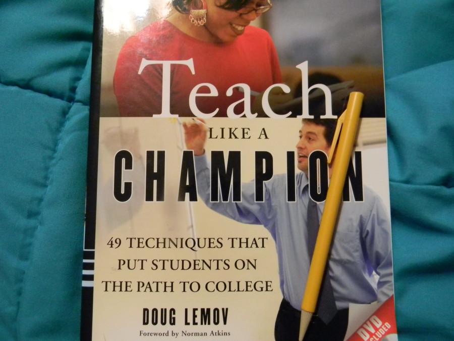 Close-up of text book entitled Teach like a Champion
