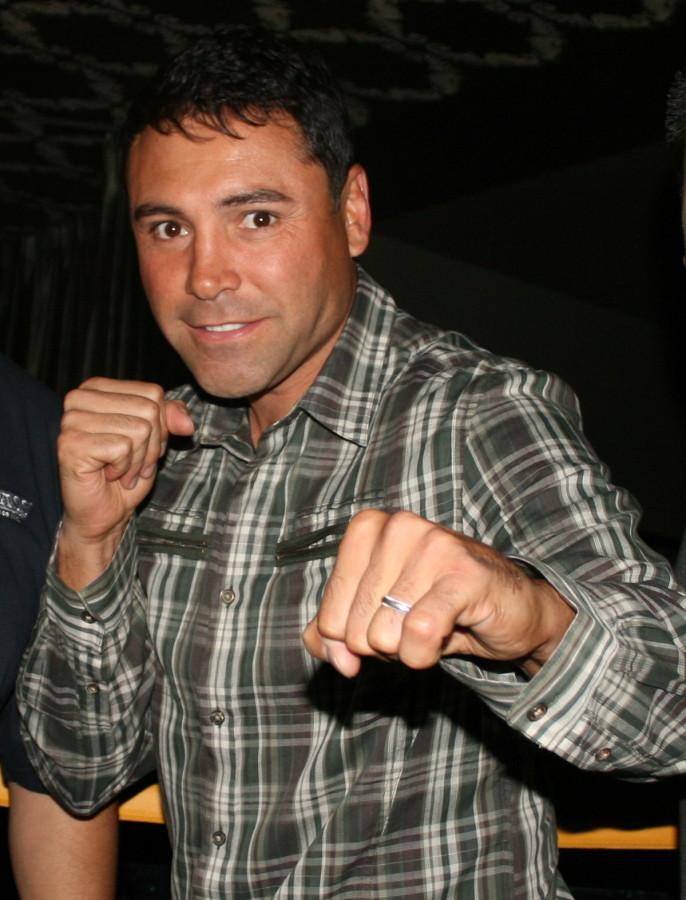De La Hoya represents Hispanic culture through boxing success.