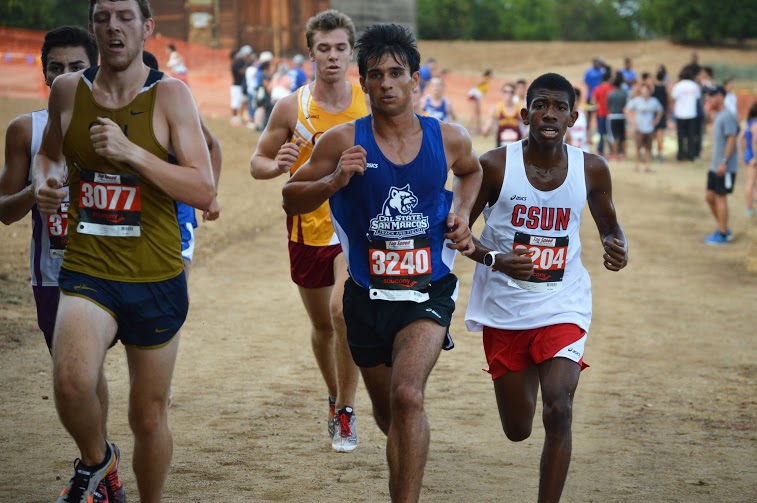 Running with Cougars: Halfway through the season cross country teams striding by competition