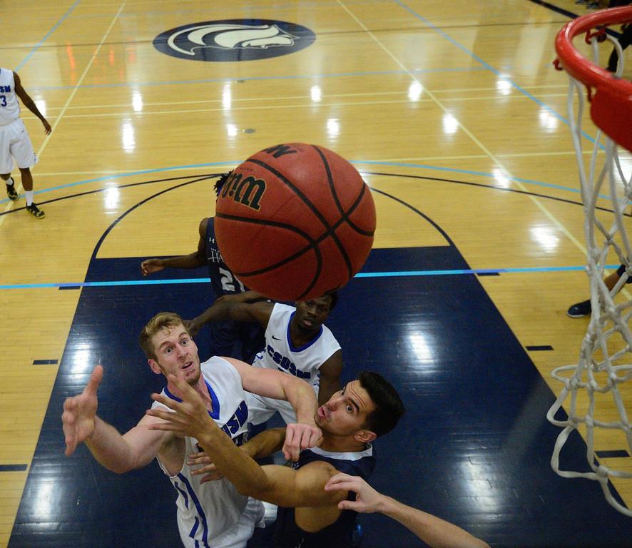 November 21, 2015 San Diego Christian vs Cal State San Marcos mens basketball at Mira Costa Community College Gym. Photographer:  Bruce Sherwood