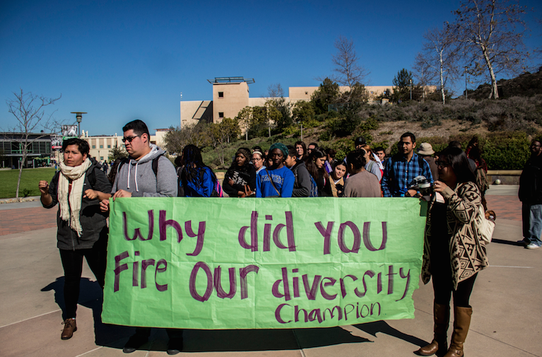 Students protesting in front of Kellogg Library. Photo by Jeffrey Davis, Photographer.
