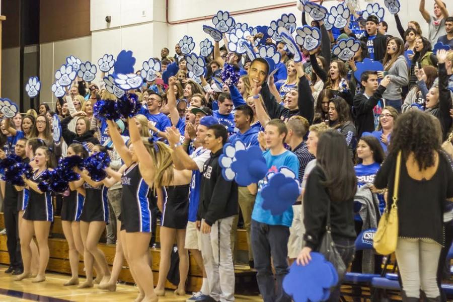 CSUSM students cheering for the men’s basketball team in the 2013 Homecoming game.