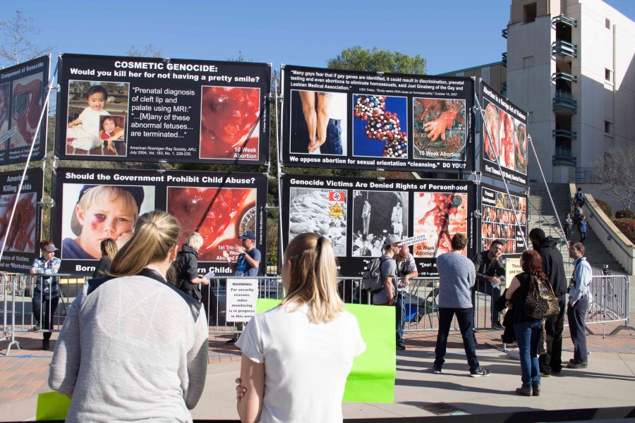 Students+stand+in+solidarity+against+anti-abortion+display