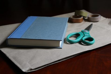 Learn to create an artistic book cover to protect your textbook