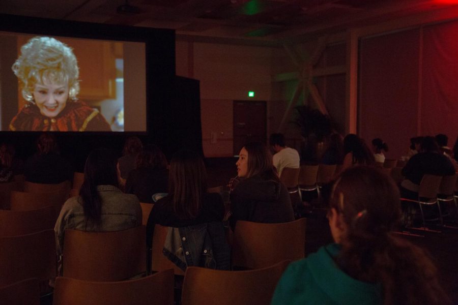 On+Oct.+16+students+gather+around+a+screen+in+the+USU+ballroom+to+watch+the+classic+film%2C+Halloweentown