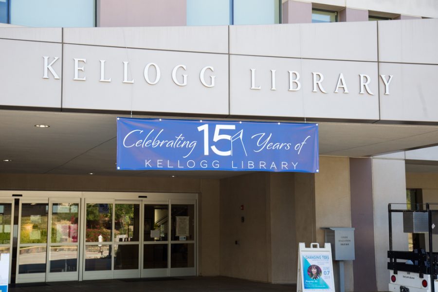 This banner hangs above the entrance doors of Kellogg Library to commemorate the 15 years it has been open.
