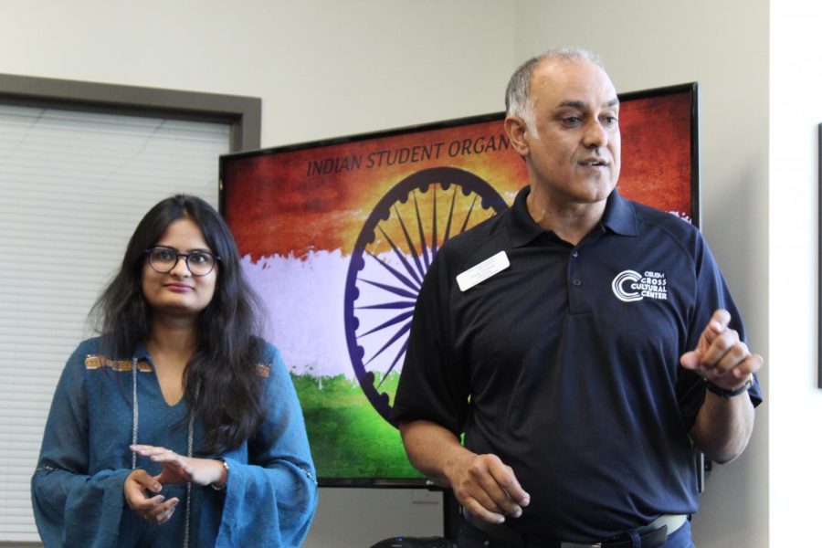 Devanshi Upadhyaya (left) and Tony Chahal (right) share various aspects of their Indian culture at the Cross-Cultural Center.