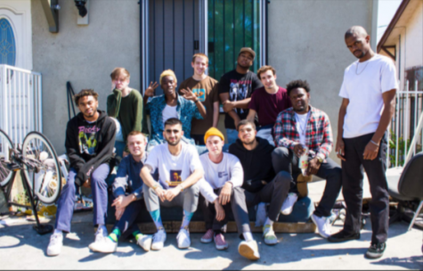 BROCKHAMPTON sits outside their home in south central in LA.
