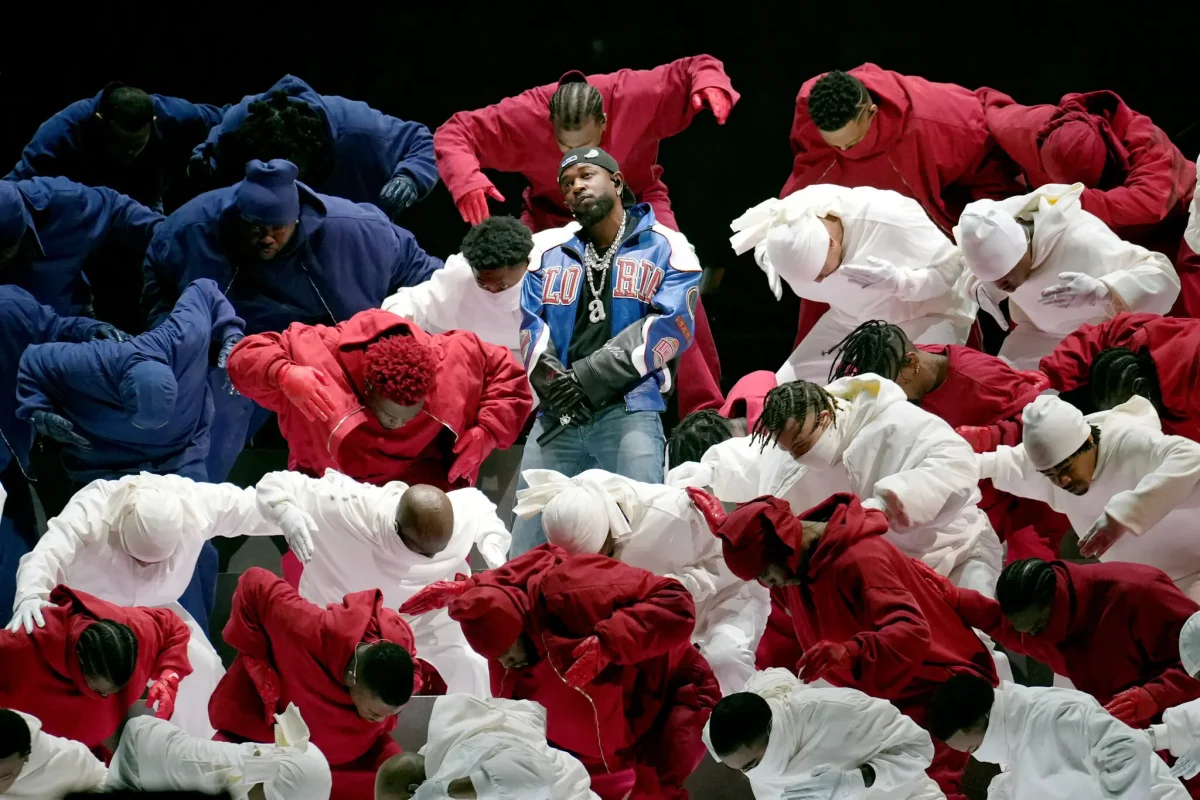 Kendrick Lamar's powerful performance with his dancers forming an American flag.